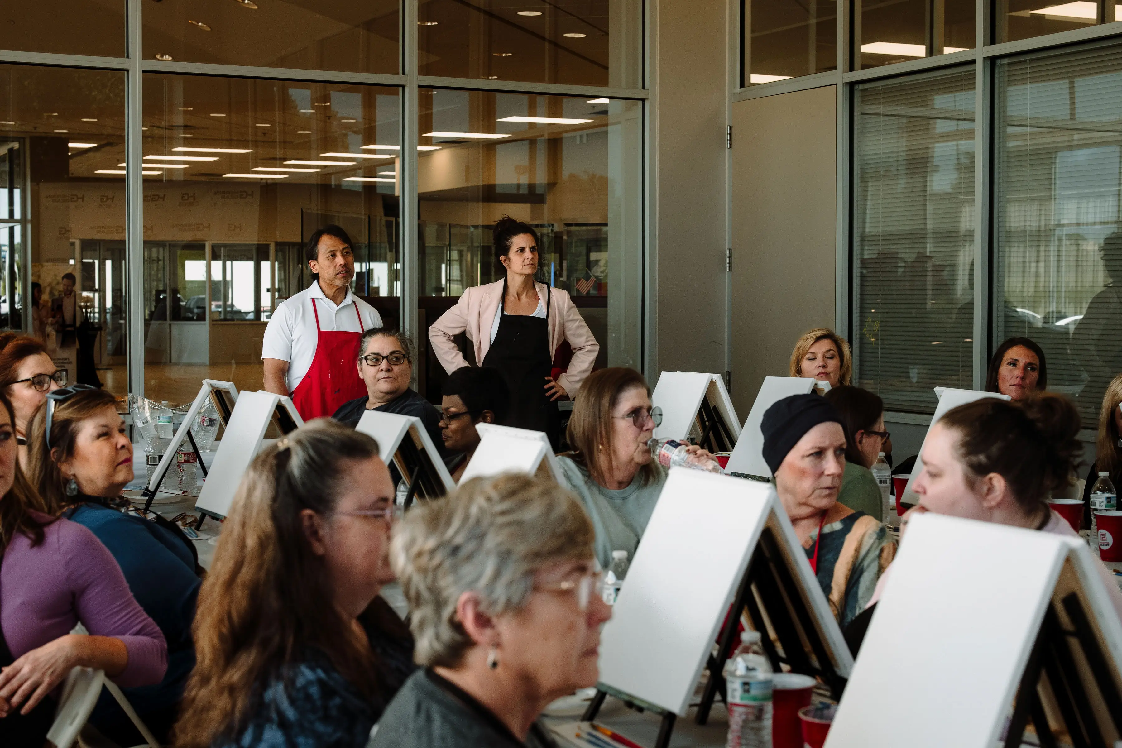 Guests painting at Paint with Purpose